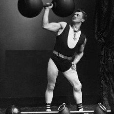 Eugen Sandow one of the Strongman Physical Culturists posing with a dumbbell