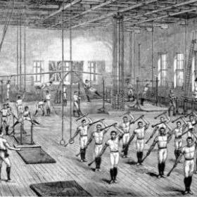 Turnen men expressing their Physical Culture by doing gymnastics and swinging clubs in a Turnverein gymnasium